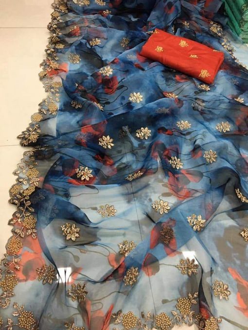 Pretty Look Net Fabric Embroidery Floral Patch Work Blue Color Saree With Red Blouse Piece